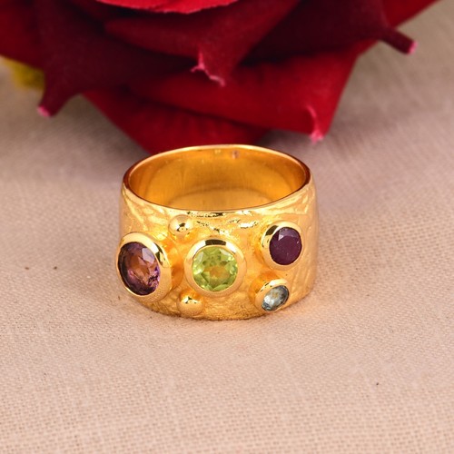 Anello multipietra oro giallo